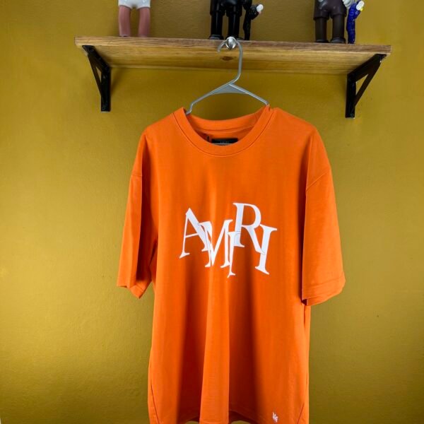 AMIRI NARANJA PLAYERA